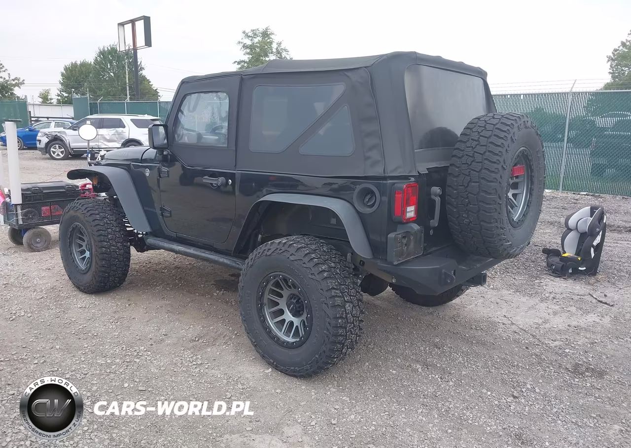 2017 Jeep Wrangler Willys Wheeler VIN:1C4AJWAG3HL570455 - 3
