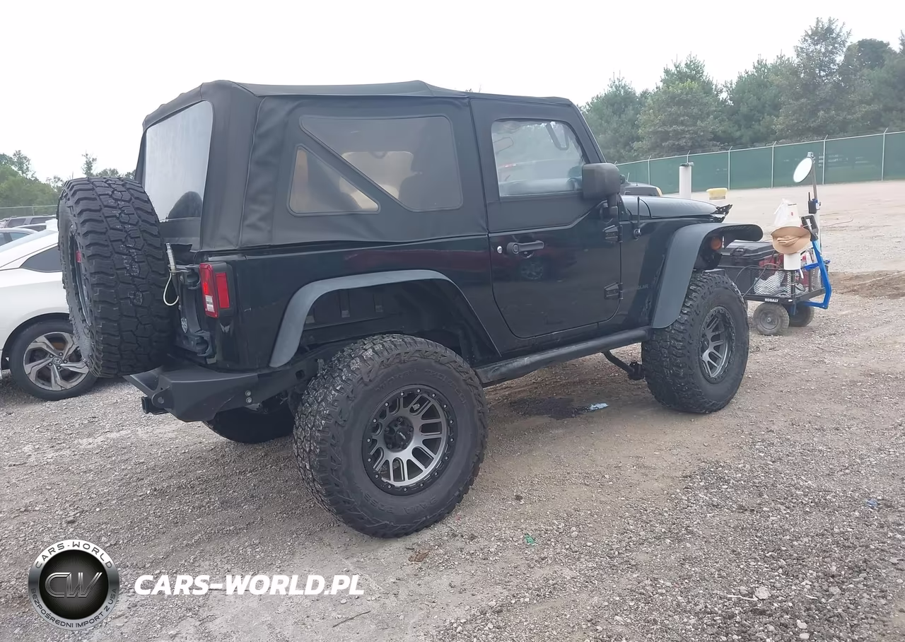 2017 Jeep Wrangler Willys Wheeler VIN:1C4AJWAG3HL570455 - 4