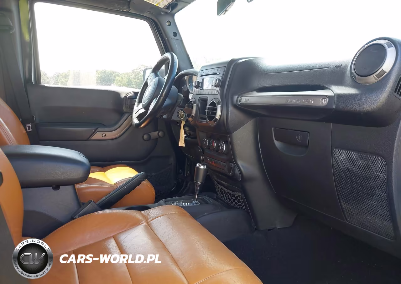 2012 Jeep Wrangler Unlimited Sport VIN:1C4BJWDG5CL166436 - 5