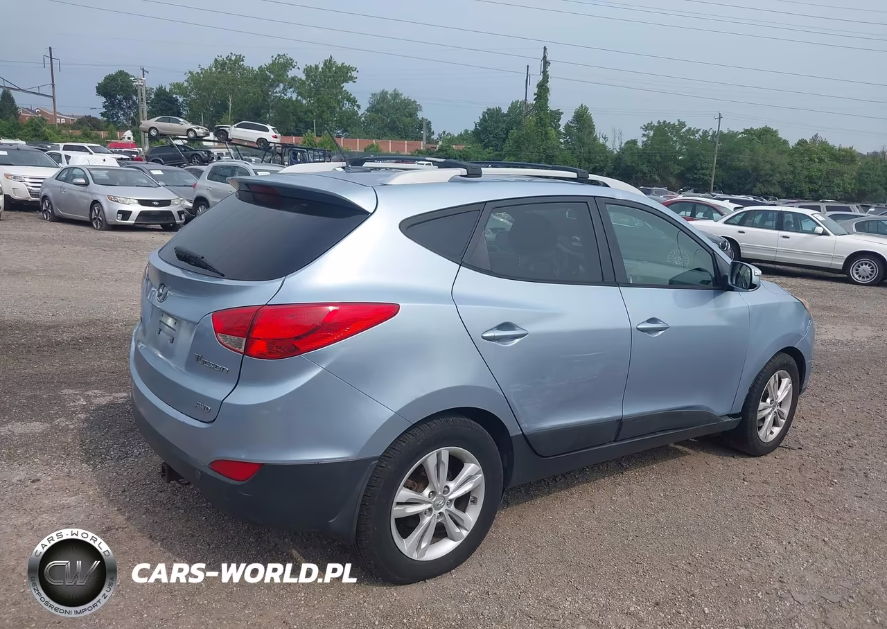 2012 Hyundai Tucson Gls VIN:KM8JUCAC3CU519149 - 4