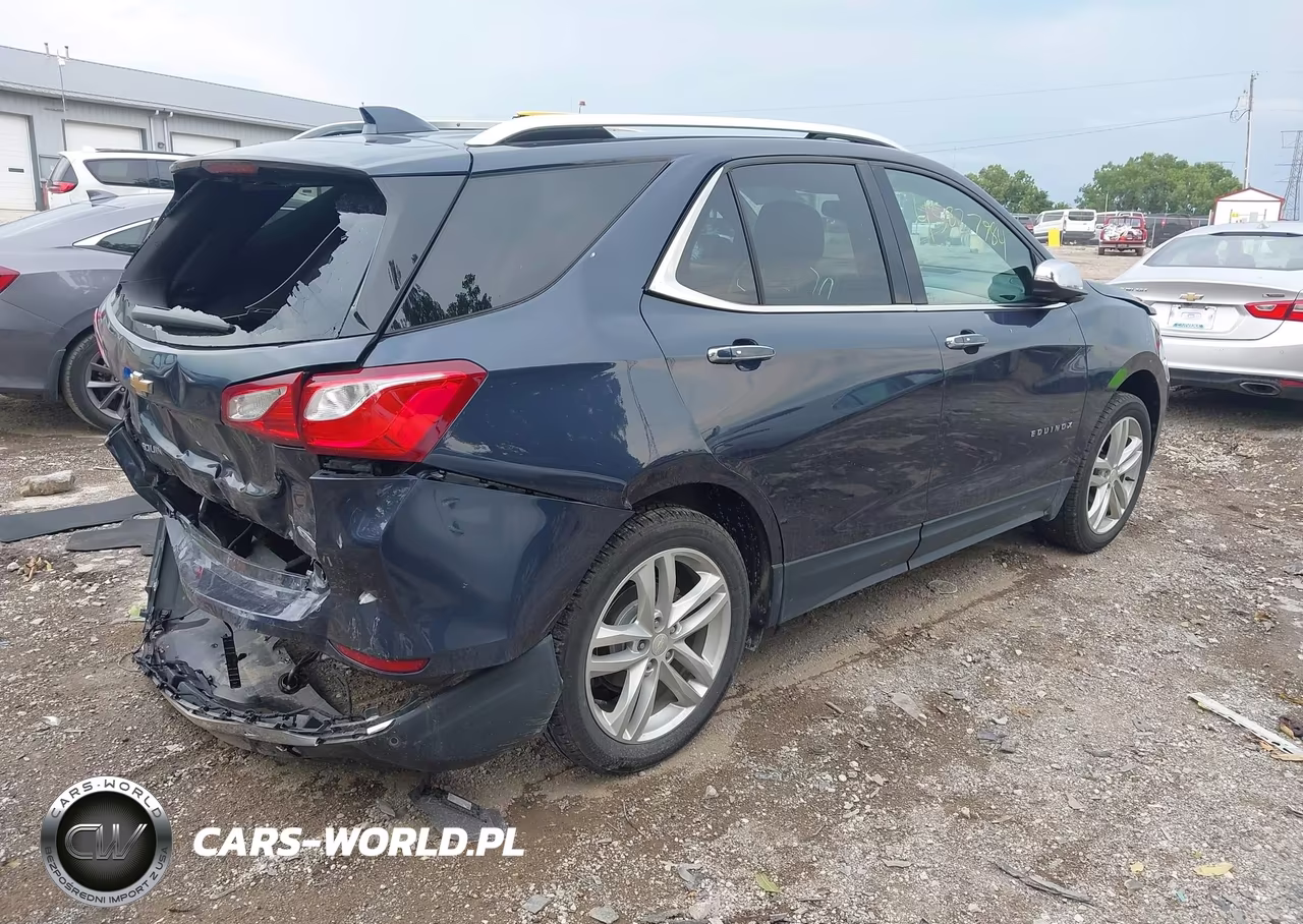 2018 Chevrolet Equinox Premier VIN:3GNAXVEV0JL154821 - 4