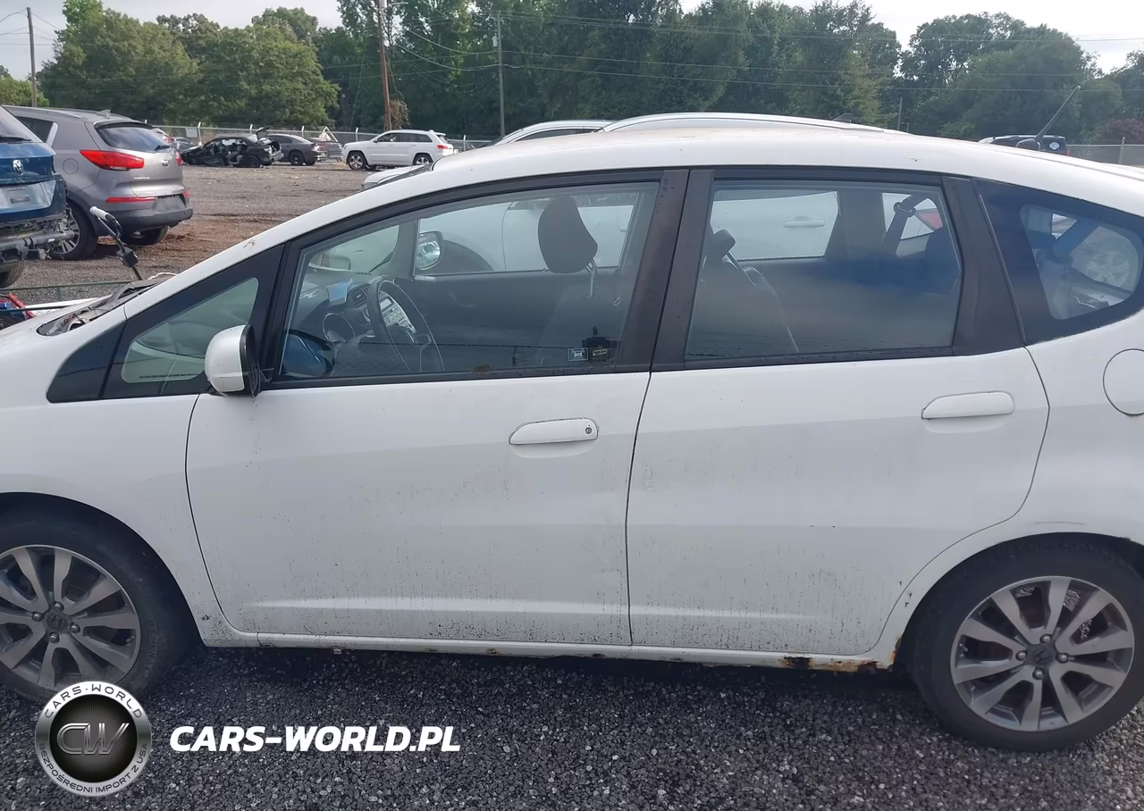 2012 Honda Fit Sport VIN:JHMGE8G55CC021542 - 14