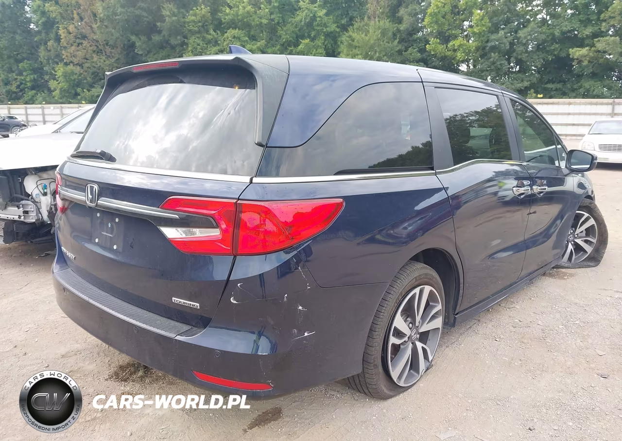 2023 Honda Odyssey Touring VIN:5FNRL6H81PB064040 - 4