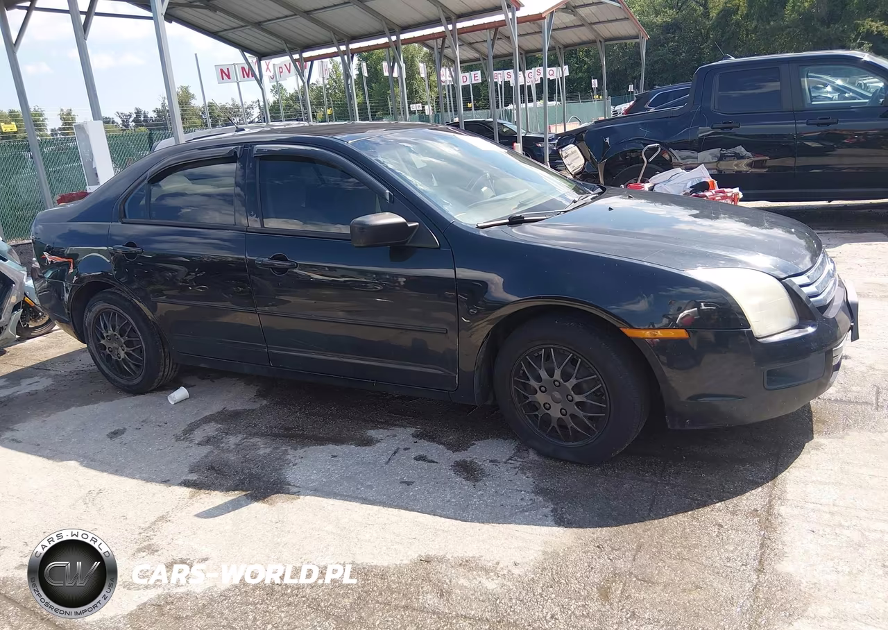 2009 Ford Fusion S VIN:3FAHP06ZX9R185309 - 13