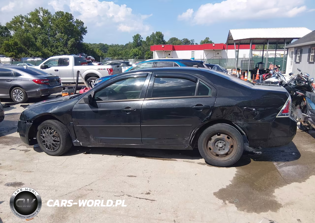 2009 Ford Fusion S VIN:3FAHP06ZX9R185309 - 14