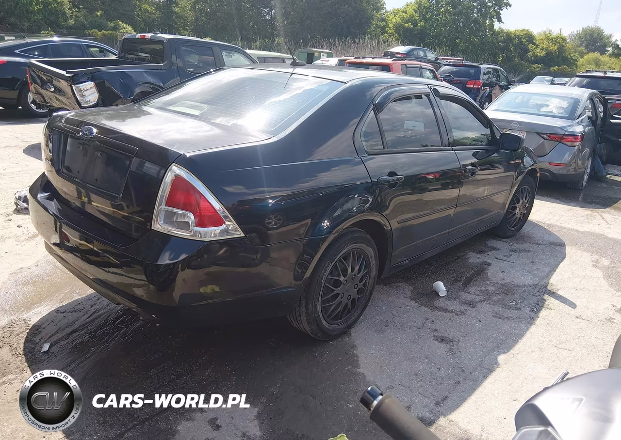 2009 Ford Fusion S VIN:3FAHP06ZX9R185309 - 4