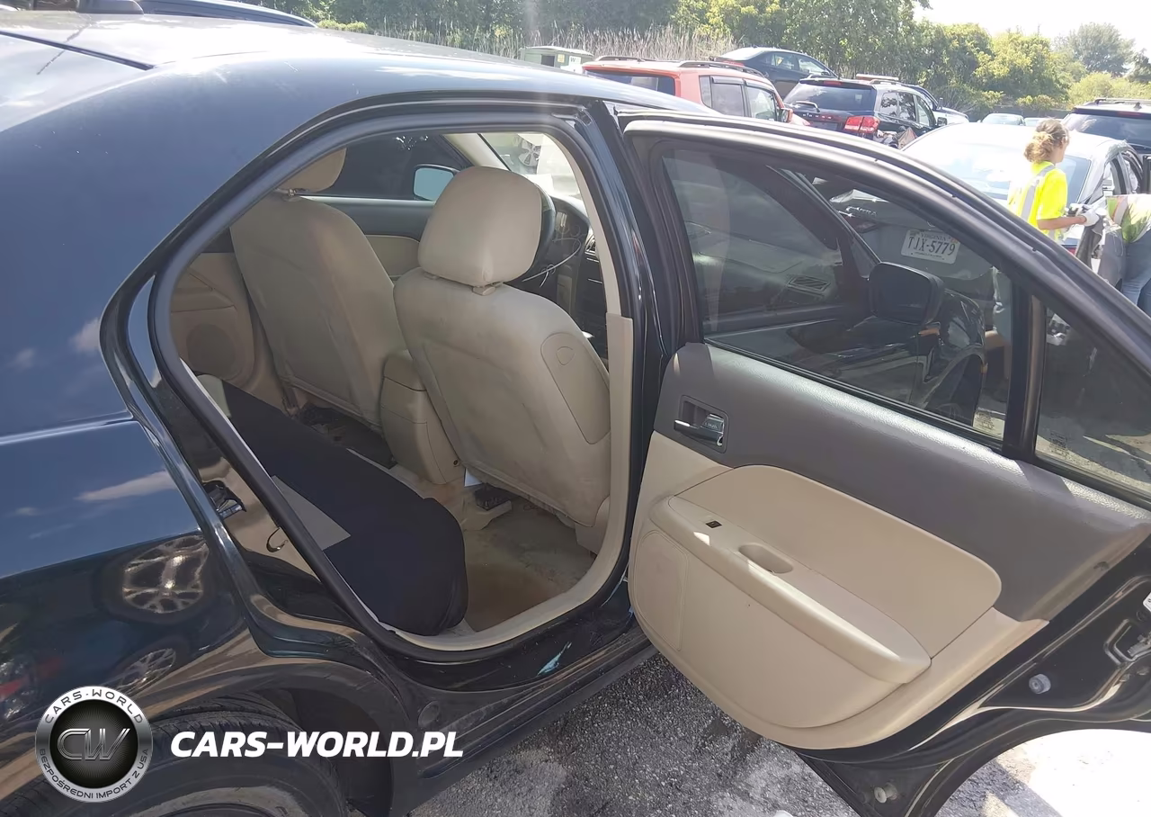 2009 Ford Fusion S VIN:3FAHP06ZX9R185309 - 8