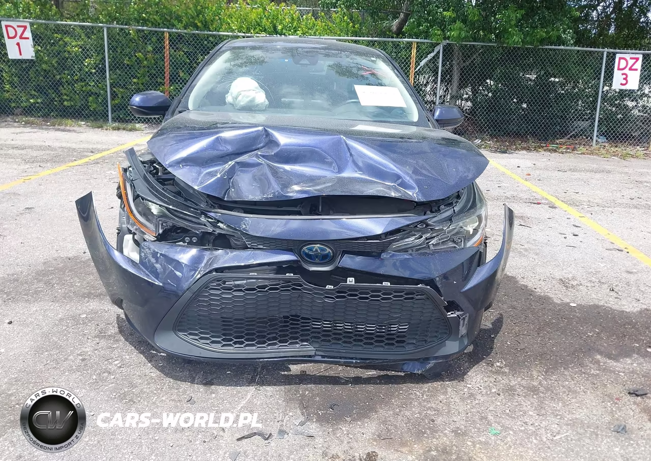 2022 Toyota Corolla Hybrid Le VIN:JTDEAMDE4NJ047128 - 12