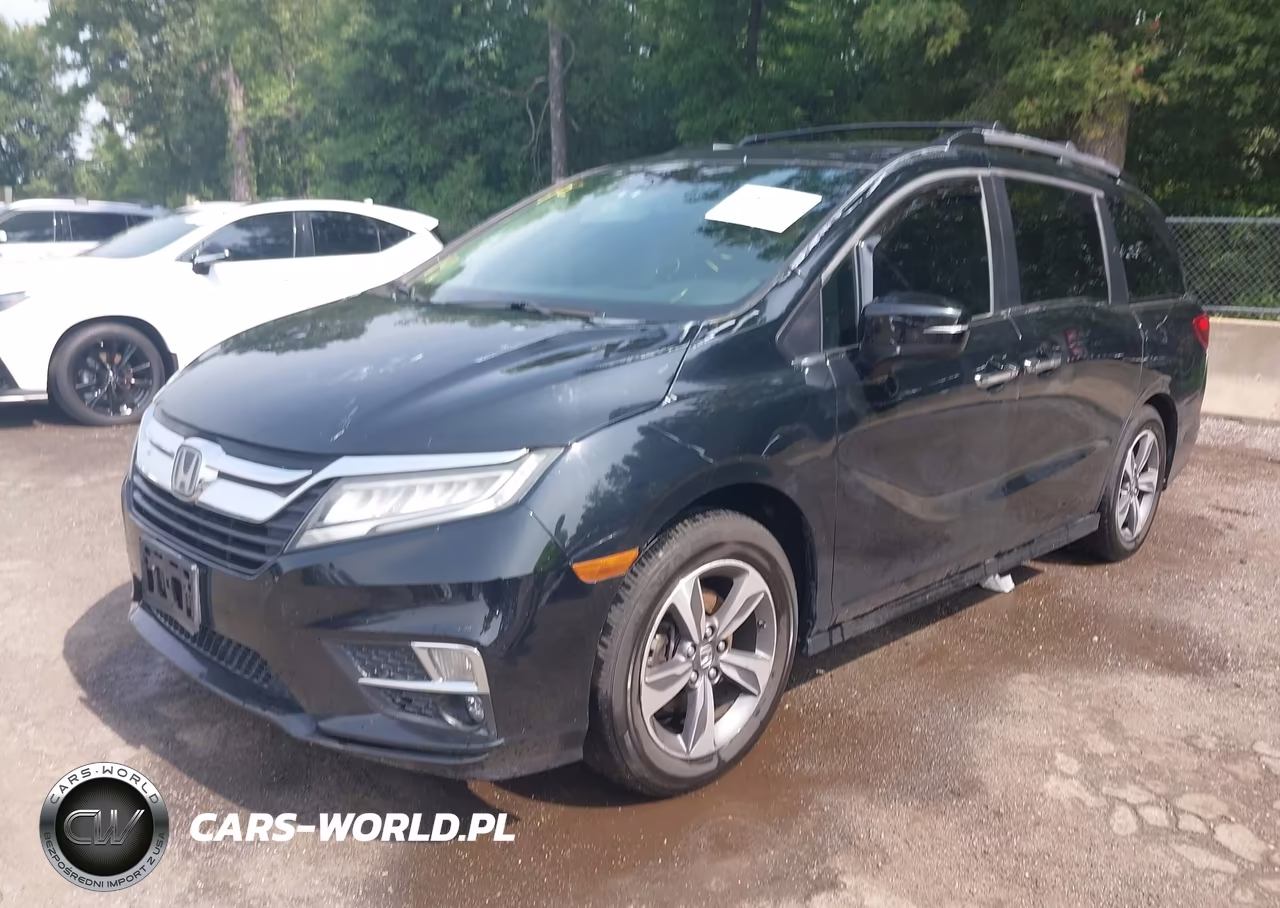 2018 Honda Odyssey Touring VIN:5FNRL6H86JB032109 - 6