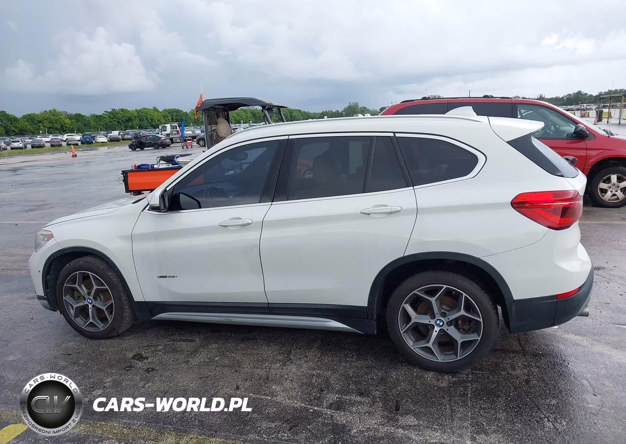 2018 BMW X1 xDrive28I VIN:WBXHT3C31J5K25147 - 14