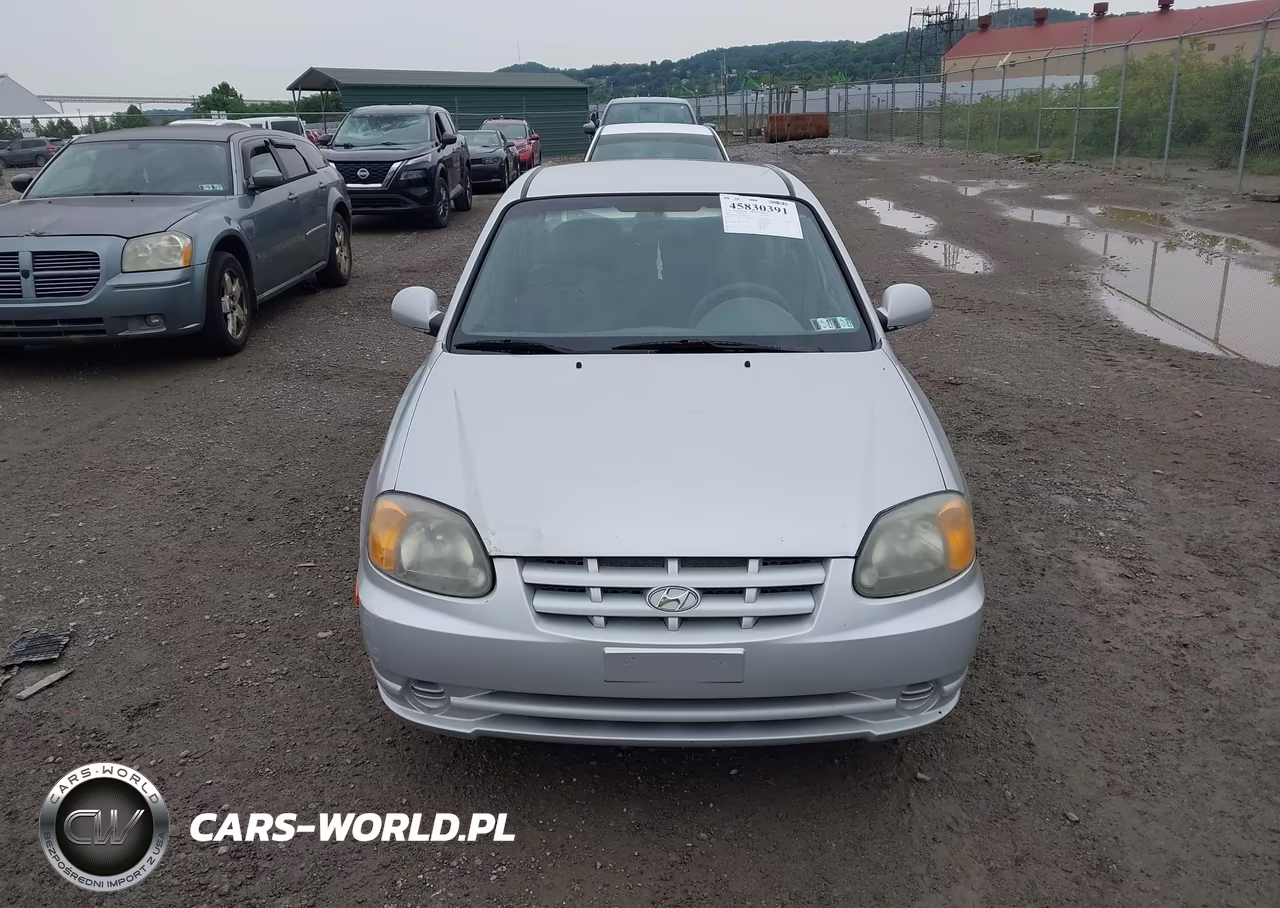 2005 Hyundai Accent Gls VIN:KMHCG45C15U659039 - 13
