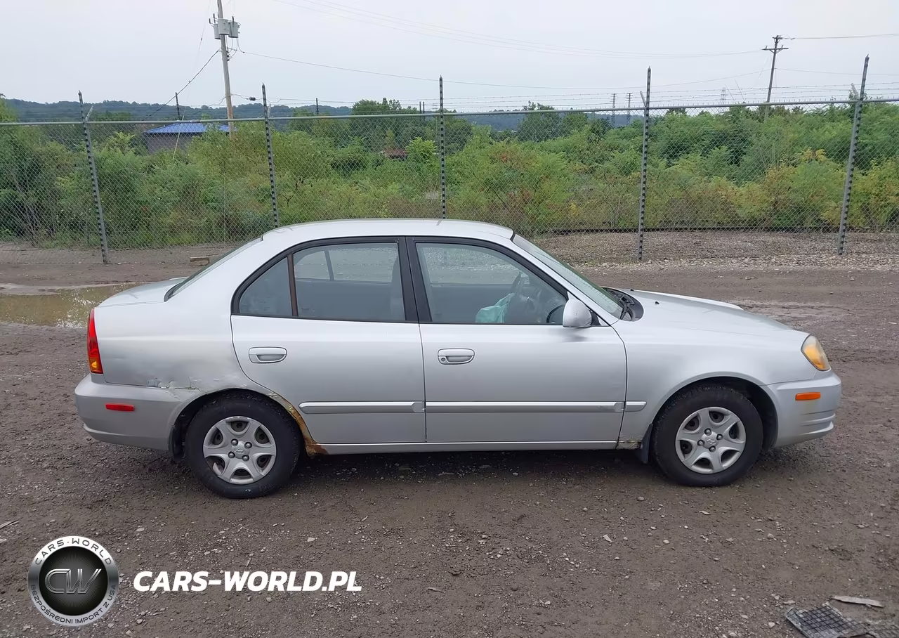 2005 Hyundai Accent Gls VIN:KMHCG45C15U659039 - 14