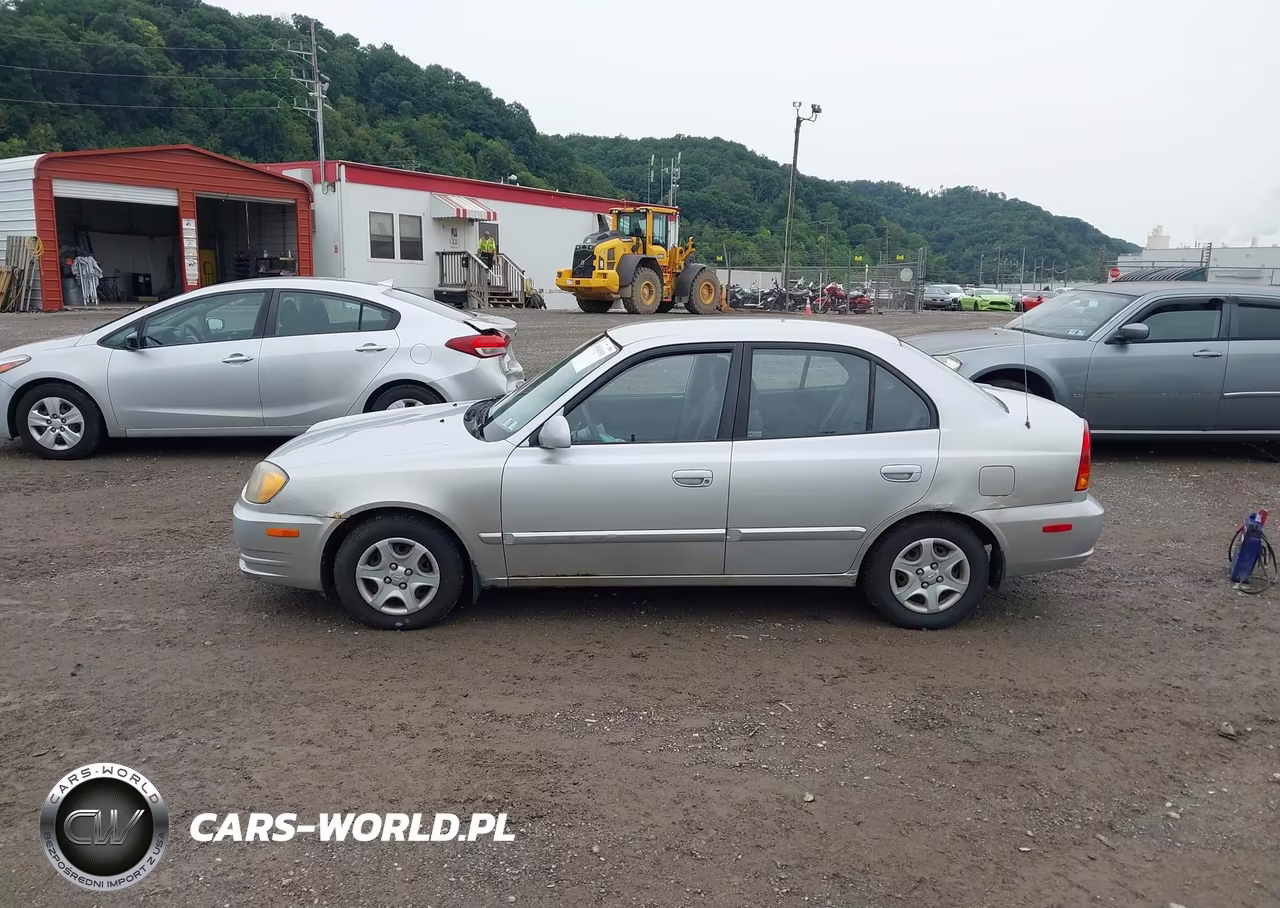 2005 Hyundai Accent Gls VIN:KMHCG45C15U659039 - 15