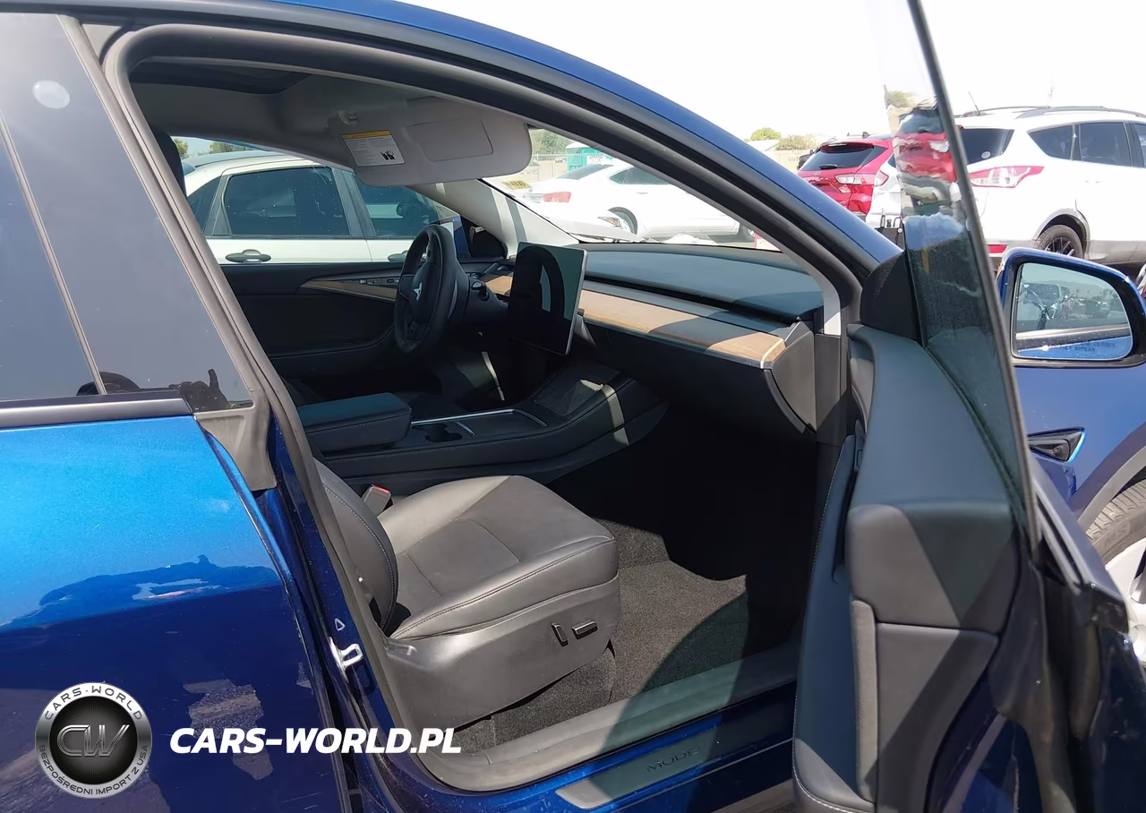 2023 Tesla Model Y VIN:7SAYGDEE7PA126281 - 5