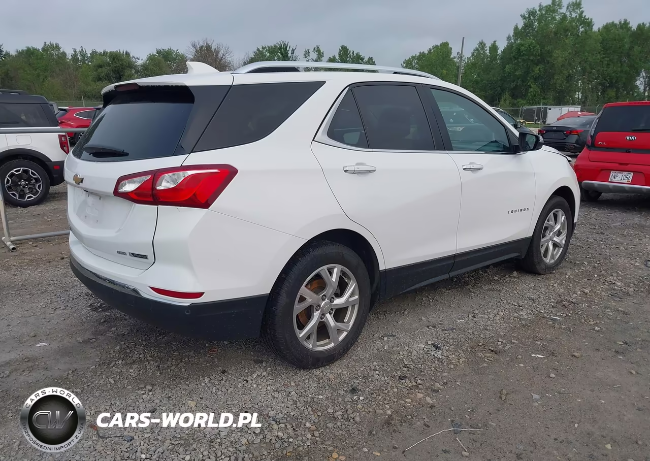 2018 Chevrolet Equinox Premier VIN:3GNAXXEU4JL173942 - 4