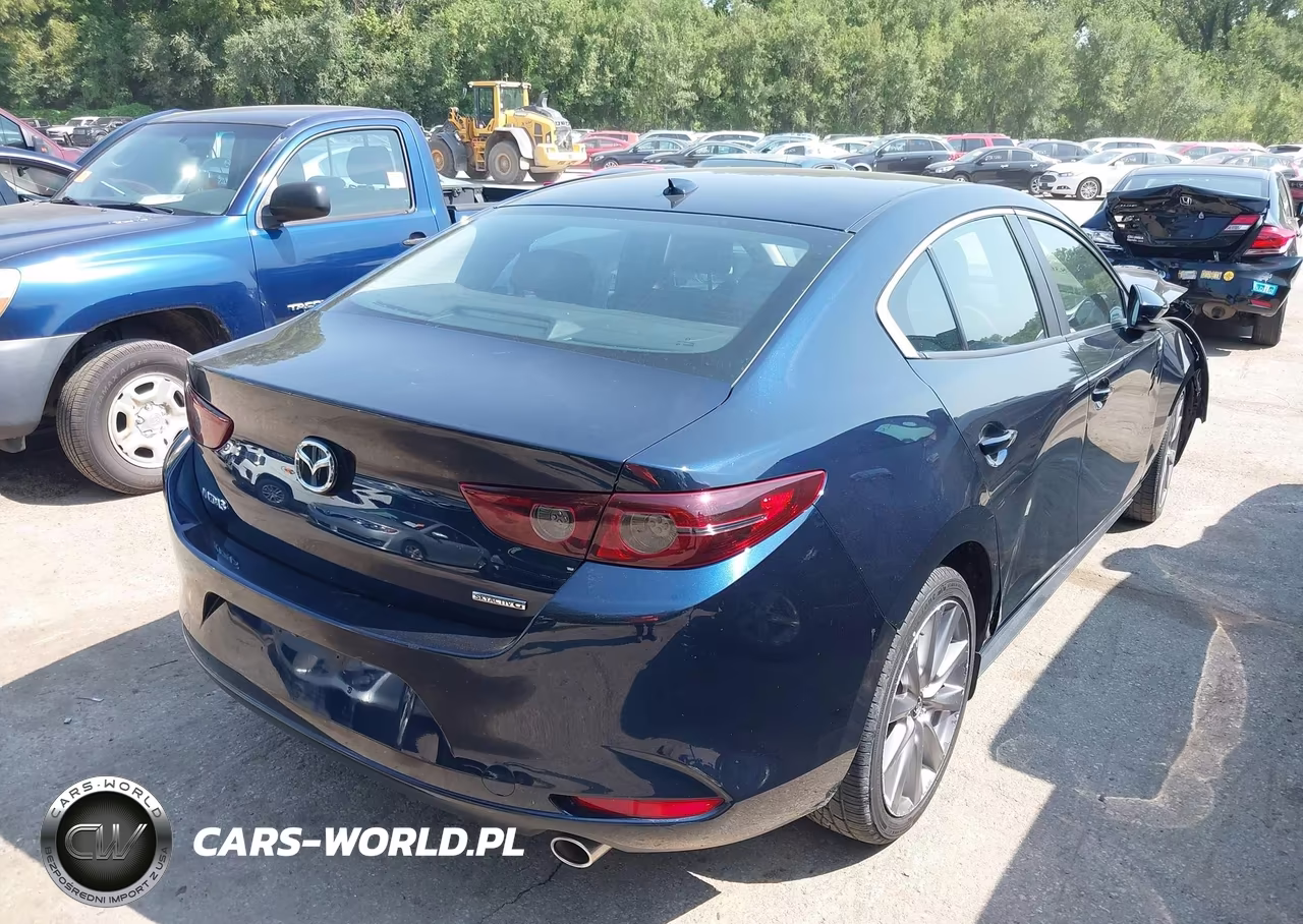 2019 Mazda Mazda3 Preferred Package VIN:3MZBPADL2KM107577 - 4