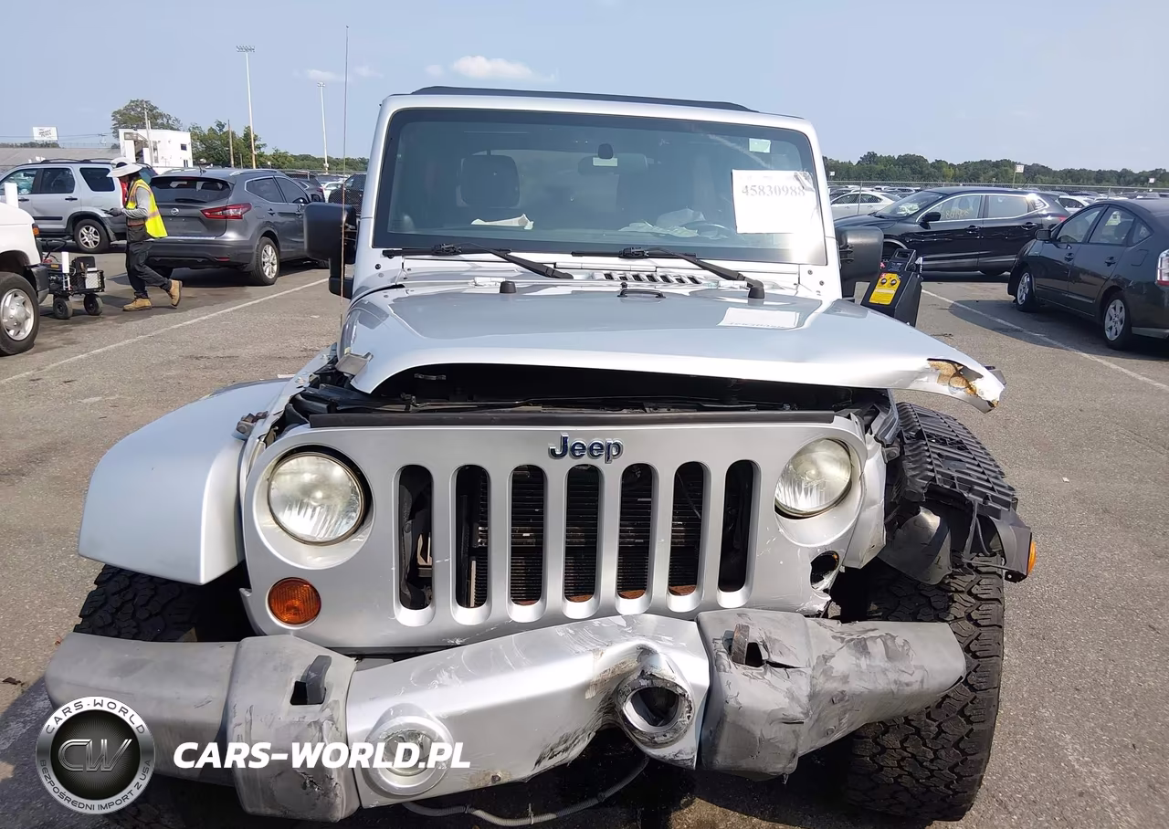 2012 Jeep Wrangler Unlimited Sahara VIN:1C4HJWEG1CL157581 - 12