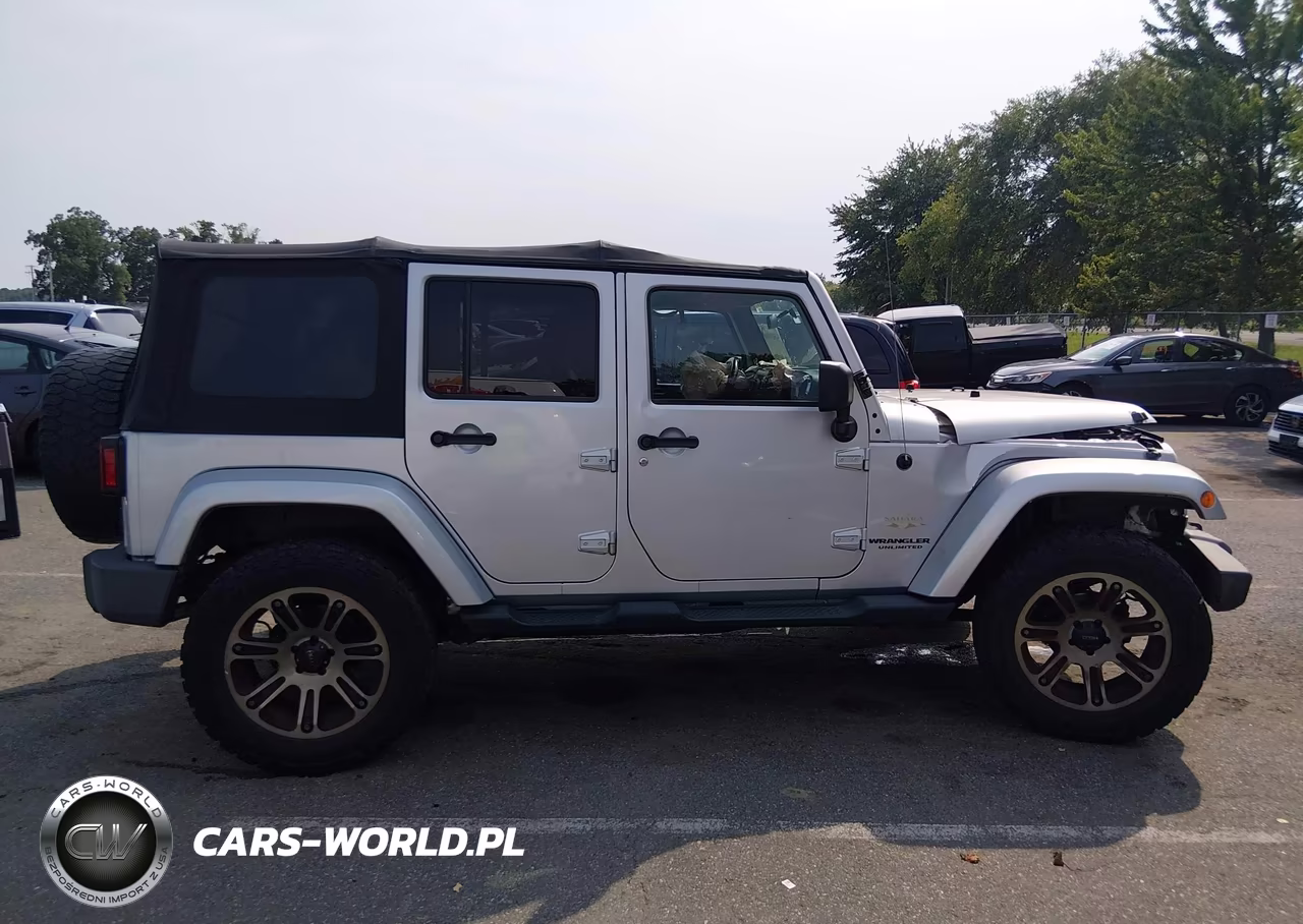 2012 Jeep Wrangler Unlimited Sahara VIN:1C4HJWEG1CL157581 - 13