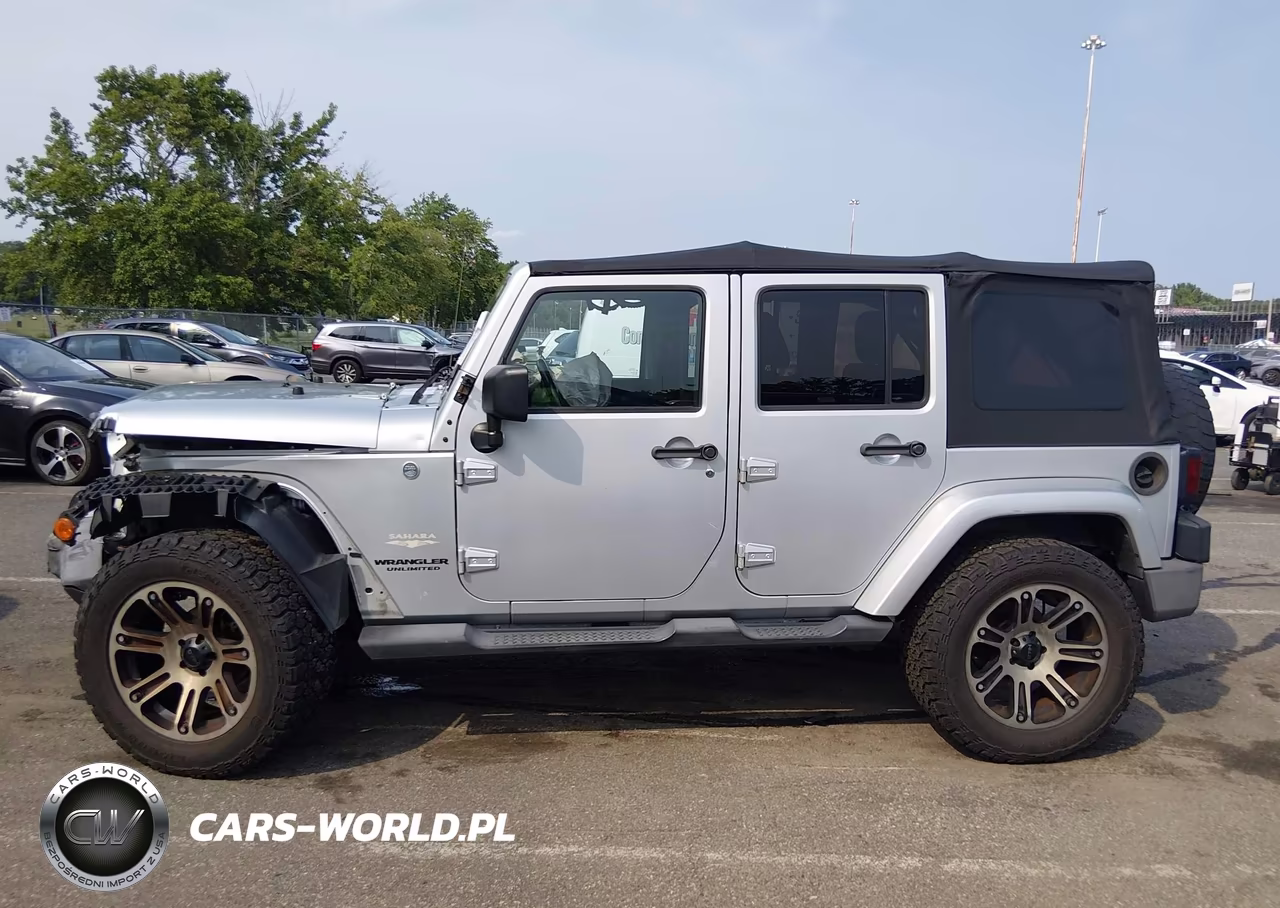 2012 Jeep Wrangler Unlimited Sahara VIN:1C4HJWEG1CL157581 - 14