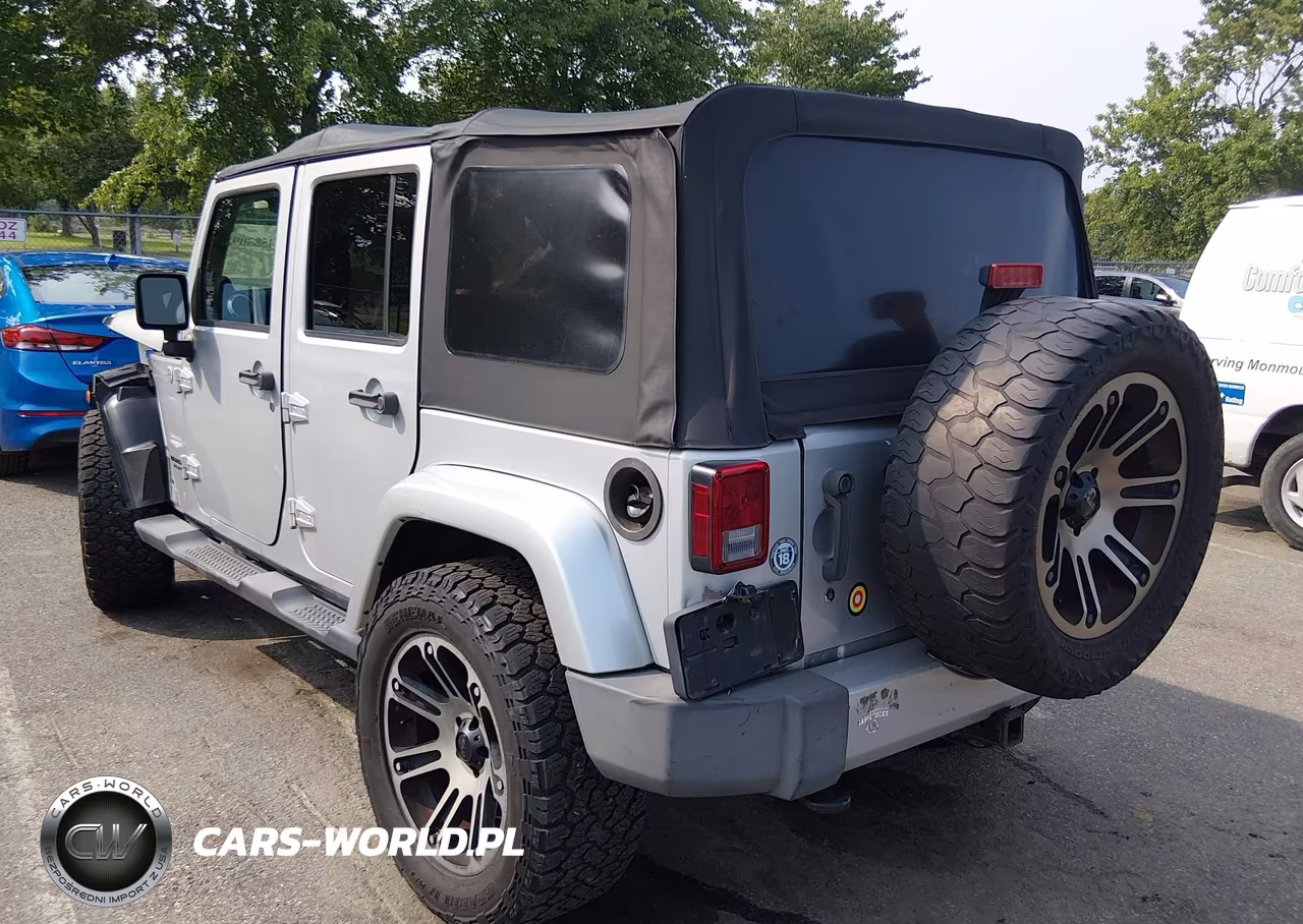 2012 Jeep Wrangler Unlimited Sahara VIN:1C4HJWEG1CL157581 - 3