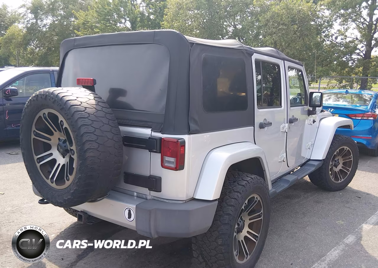 2012 Jeep Wrangler Unlimited Sahara VIN:1C4HJWEG1CL157581 - 4