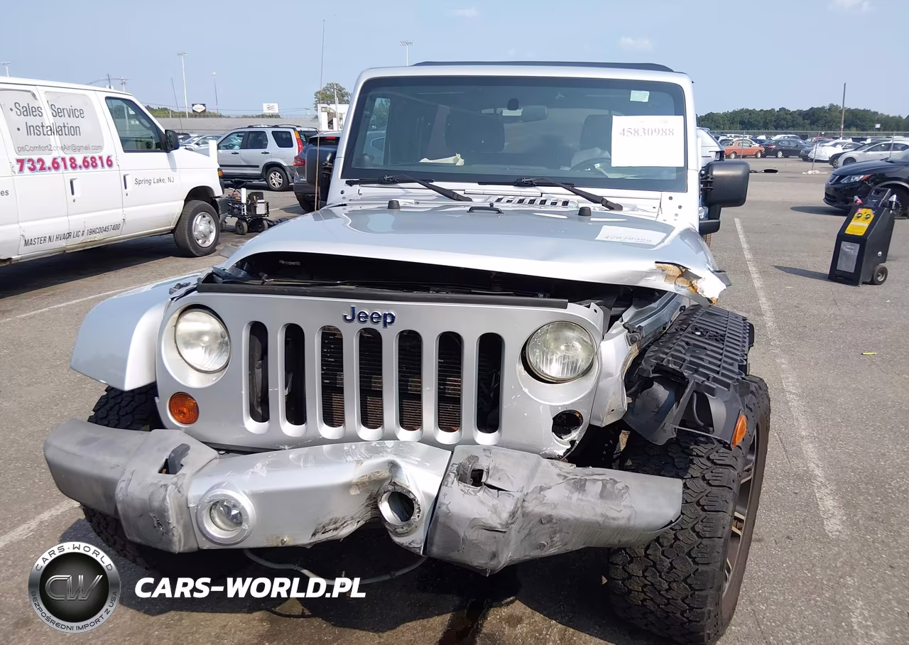 2012 Jeep Wrangler Unlimited Sahara VIN:1C4HJWEG1CL157581 - 6