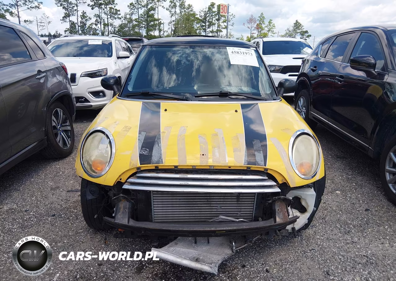 2009 Mini Cooper VIN:WMWMF33589TU76031 - 13