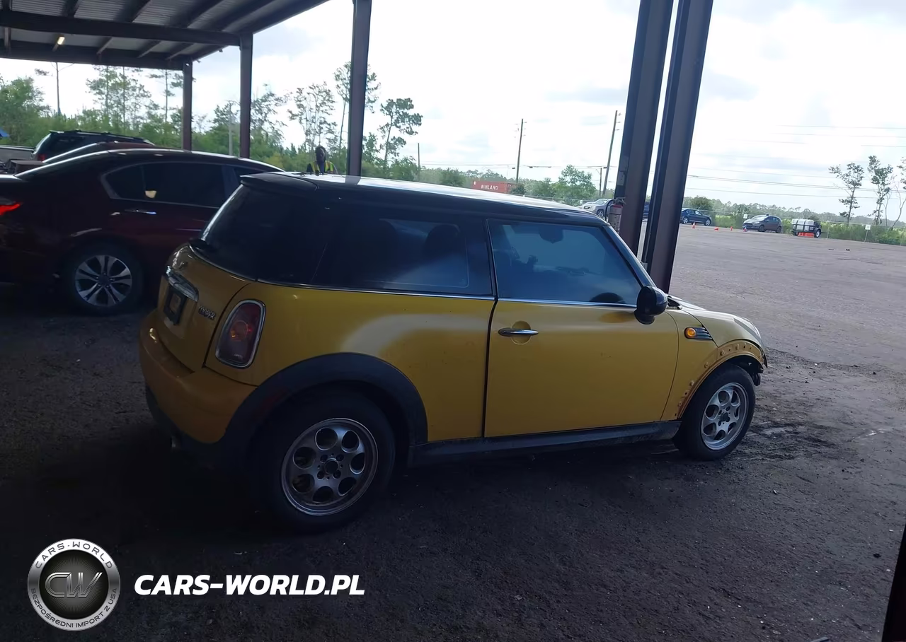 2009 Mini Cooper VIN:WMWMF33589TU76031 - 14