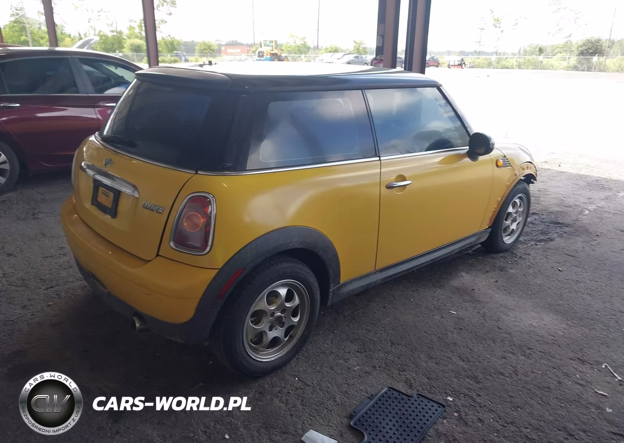 2009 Mini Cooper VIN:WMWMF33589TU76031 - 4