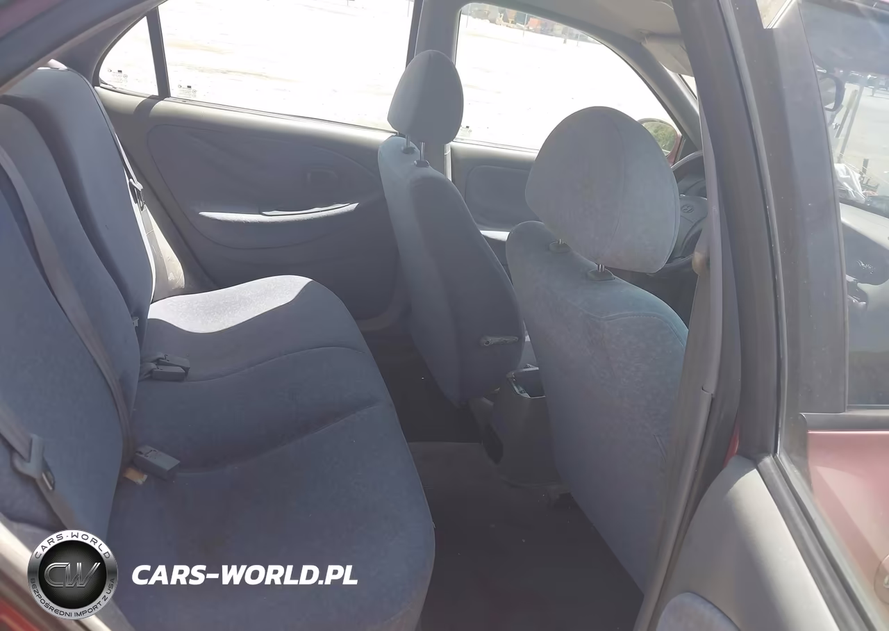 2000 Hyundai Elantra Gls VIN:KMHJW35F2YU165565 - 8