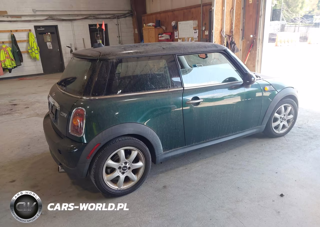 2010 Mini Cooper VIN:WMWMF3C50ATZ22080 - 4