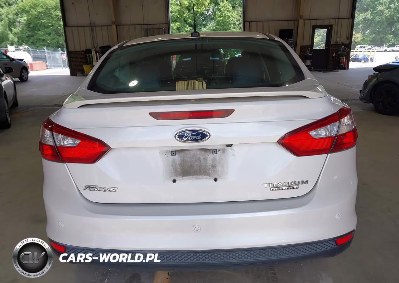 2013 Ford Focus Titanium VIN:1FADP3J25DL186661 - 16