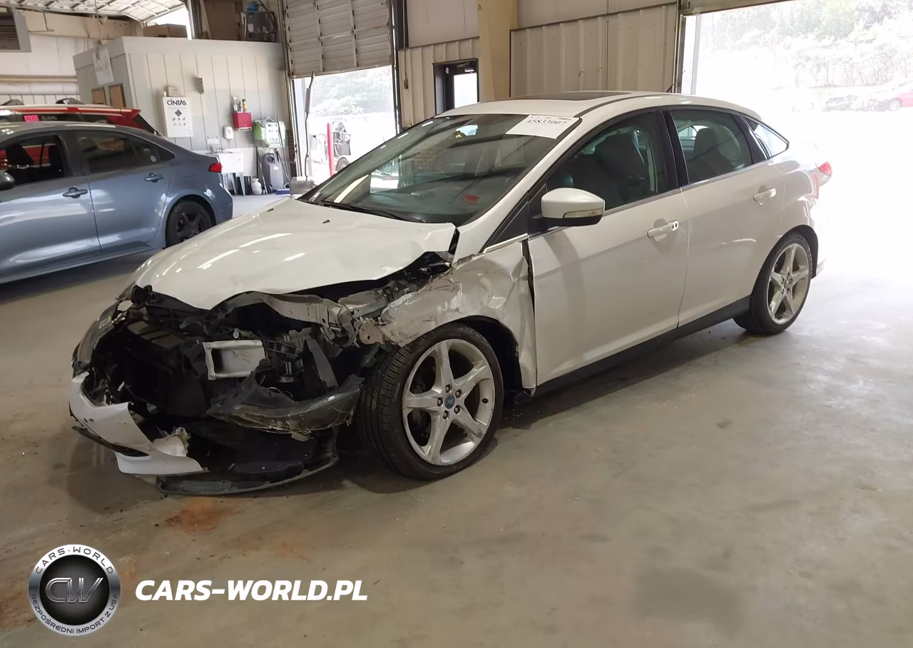 2013 Ford Focus Titanium VIN:1FADP3J25DL186661 - 2