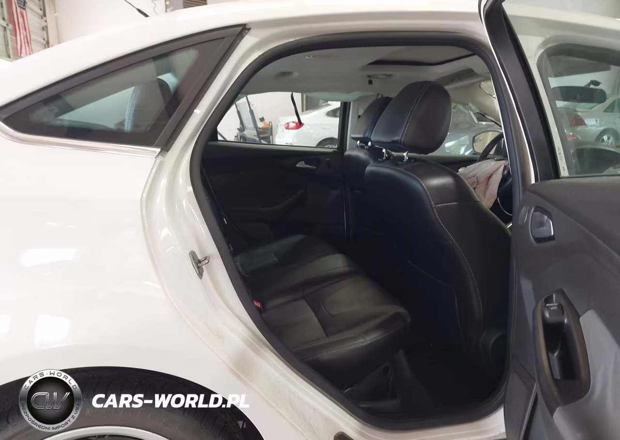 2013 Ford Focus Titanium VIN:1FADP3J25DL186661 - 8