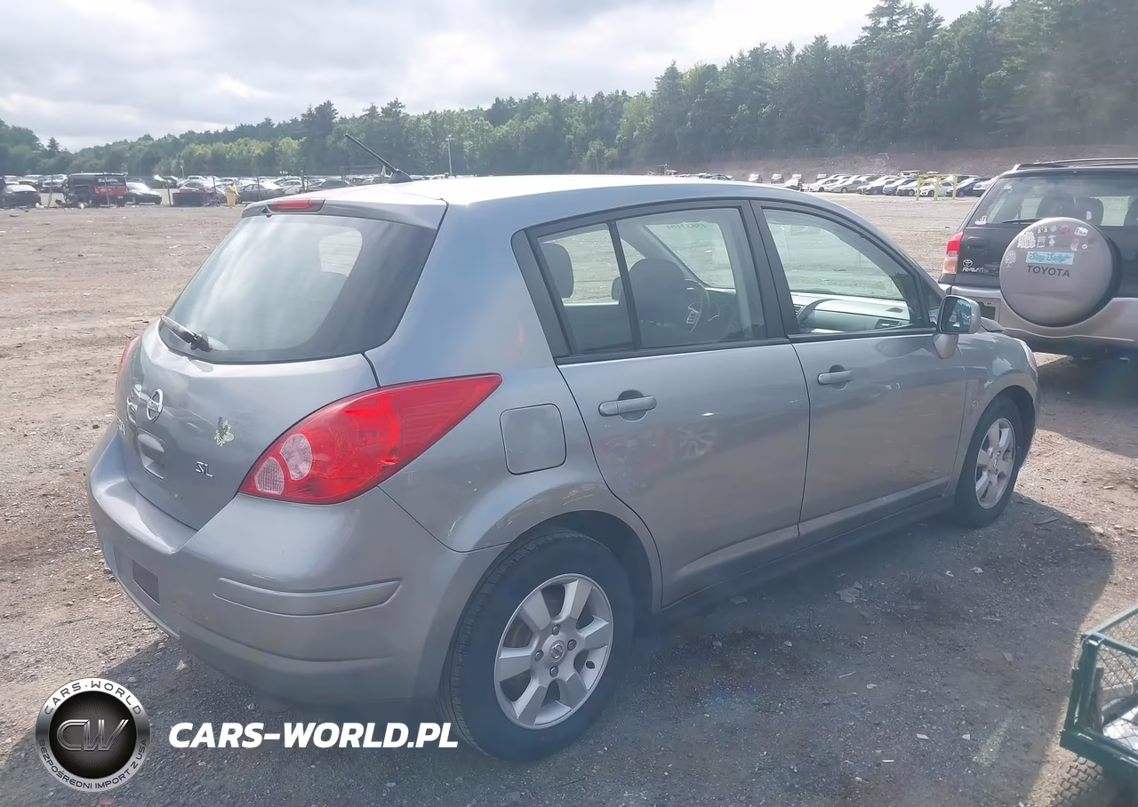 2009 Nissan Versa 1.8Sl VIN:3N1BC13EX9L406870 - 4