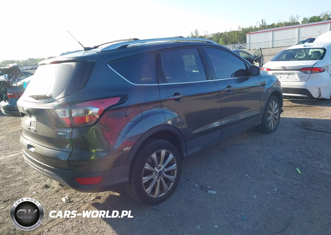 2017 Ford Escape Titanium VIN:1FMCU9JD1HUE42793 - 4