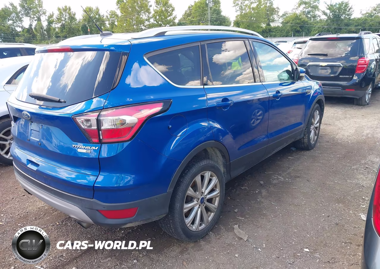 2017 Ford Escape Titanium VIN:1FMCU9JD1HUC89672 - 4