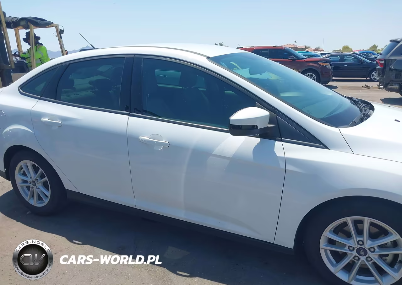 2017 Ford Focus Se VIN:1FADP3F24HL296180 - 13