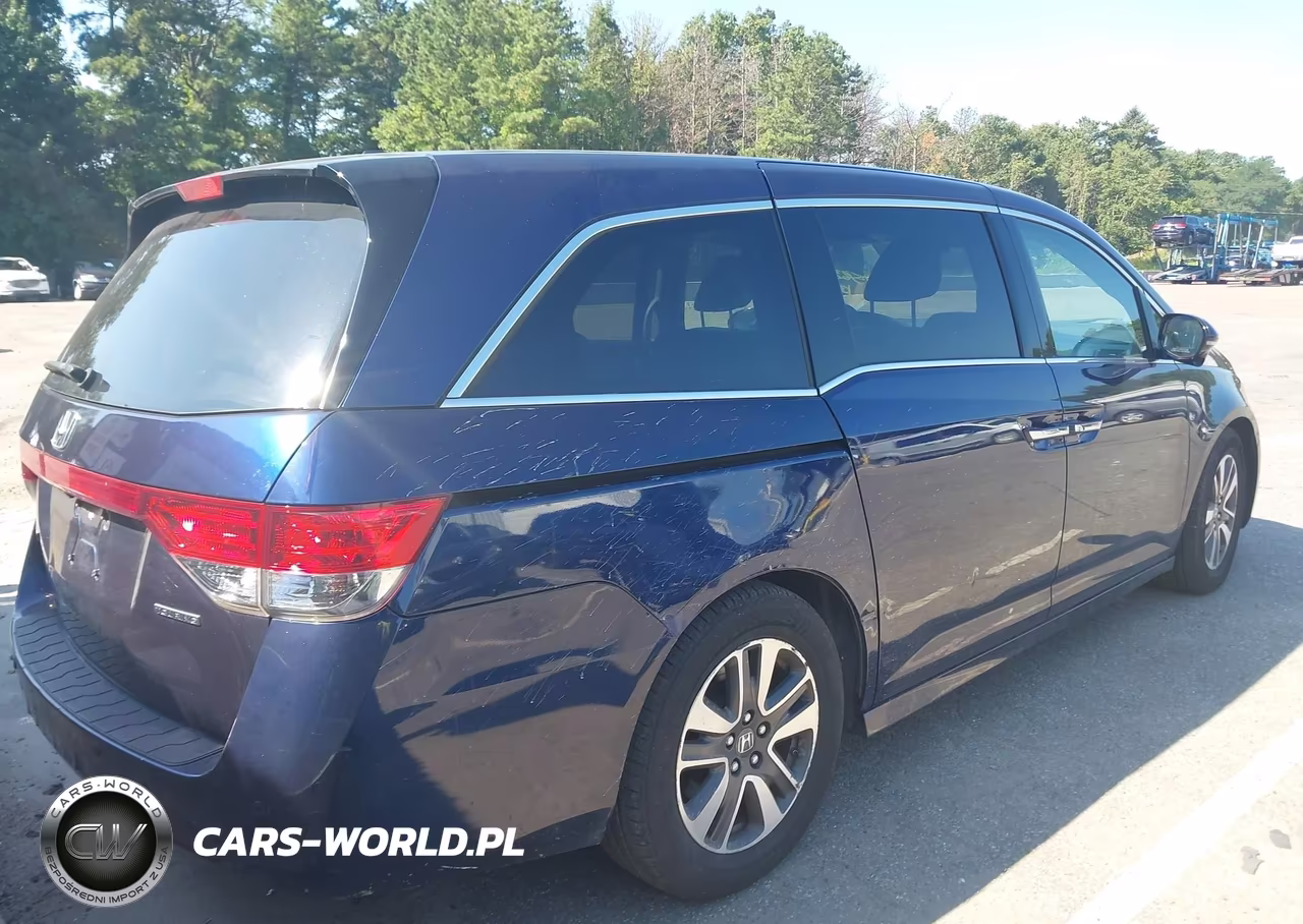 2014 Honda Odyssey Touring VIN:5FNRL5H96EB088740 - 4