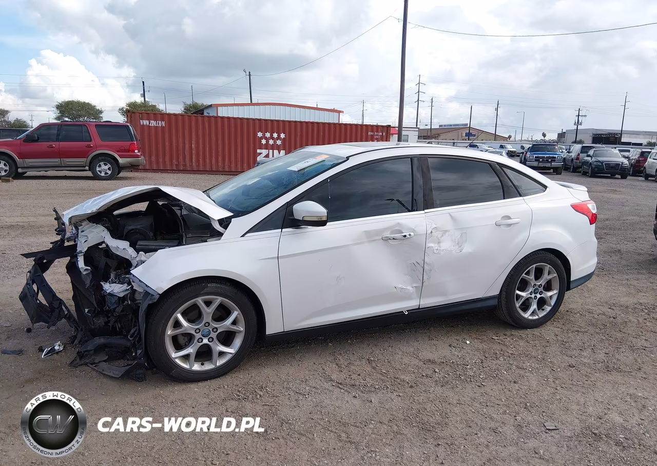 2013 Ford Focus Titanium VIN:1FADP3J28DL163567 - 14