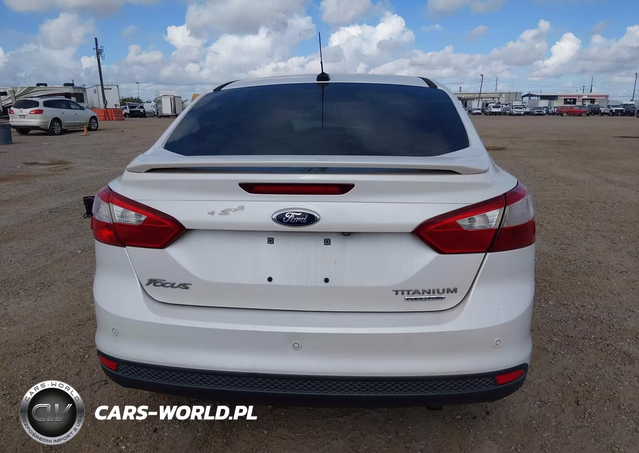 2013 Ford Focus Titanium VIN:1FADP3J28DL163567 - 16