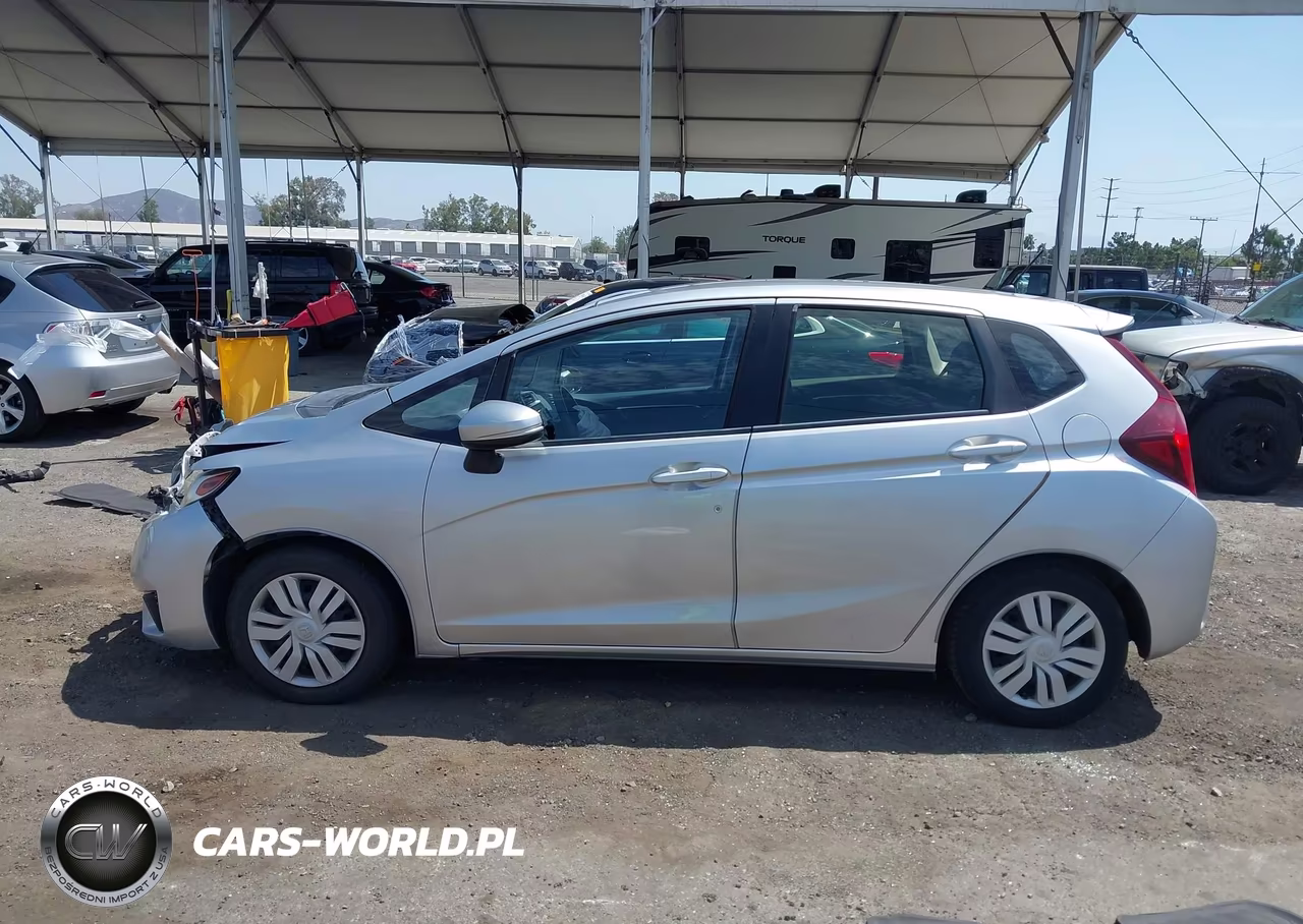 2016 Honda Fit Lx VIN:JHMGK5H53GX016120 - 14