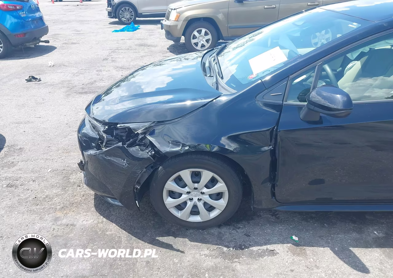 2023 Toyota Corolla Le VIN:JTDB4MEE0P3013297 - 6