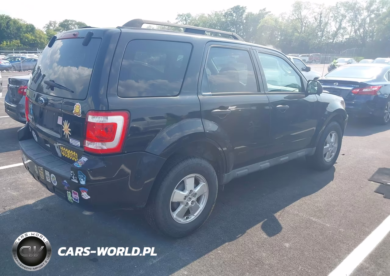 2011 Ford Escape Xlt VIN:1FMCU0D77BKA31385 - 4