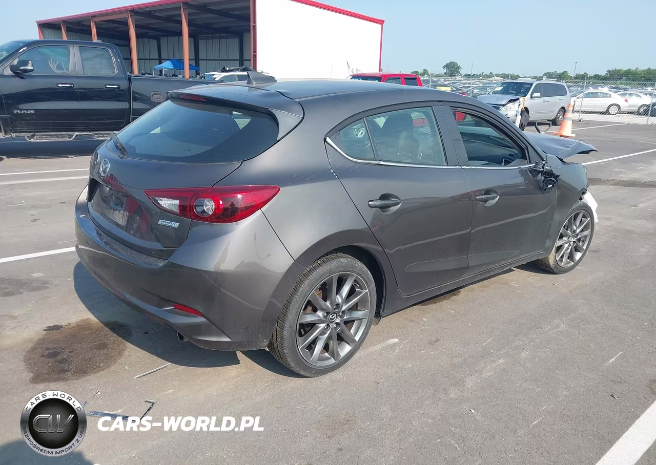 2018 Mazda Mazda3 Grand Touring VIN:3MZBN1M3XJM165392 - 4