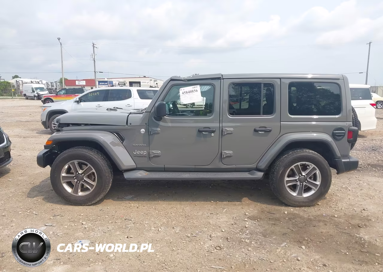 2019 Jeep Wrangler Unlimited Sahara 4X4 VIN:1C4HJXEGXKW664921 - 14