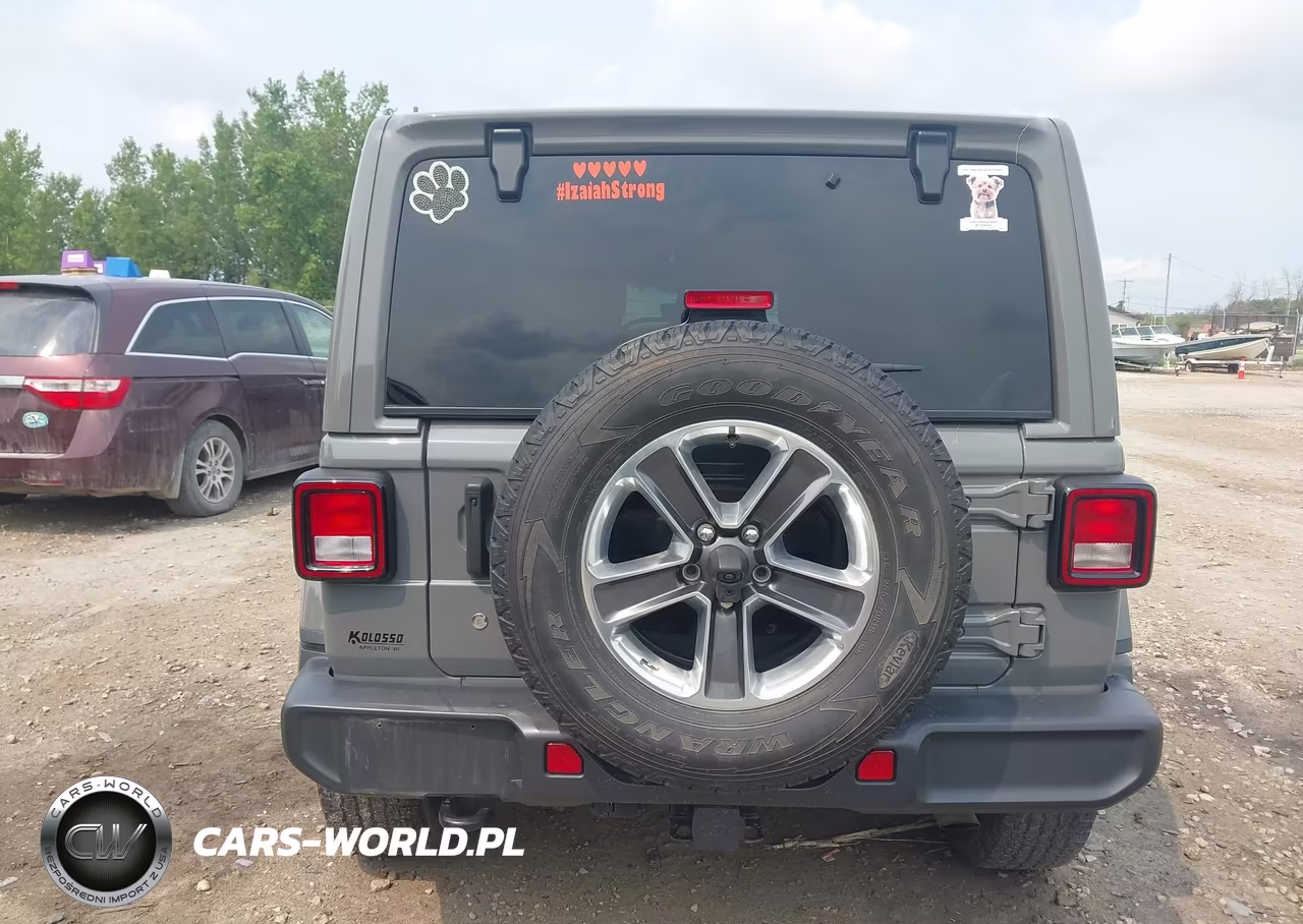 2019 Jeep Wrangler Unlimited Sahara 4X4 VIN:1C4HJXEGXKW664921 - 16