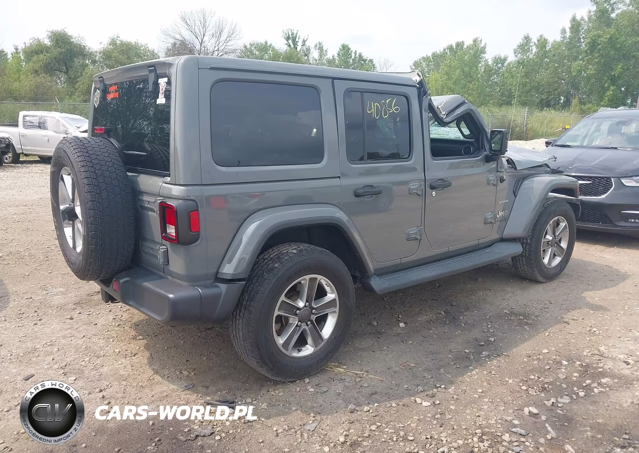 2019 Jeep Wrangler Unlimited Sahara 4X4 VIN:1C4HJXEGXKW664921 - 4