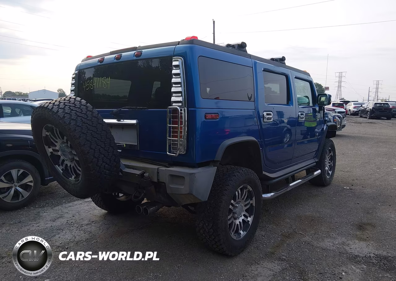 2004 Hummer H2 VIN:5GRGN23U04H115424 - 4