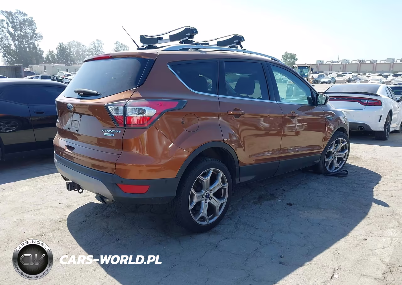 2017 Ford Escape Titanium VIN:1FMCU9J99HUA10707 - 4